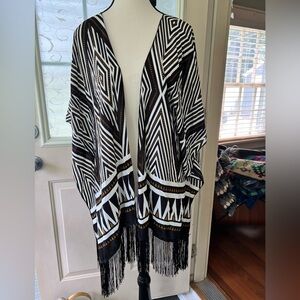 COPY - Poncho kimono wrap. This is a pretty black, brown and white linear print.